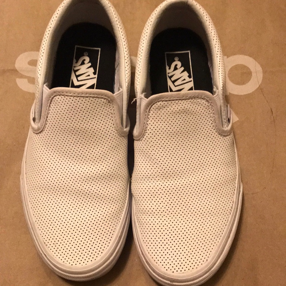 White perforated vans - with small rip shown